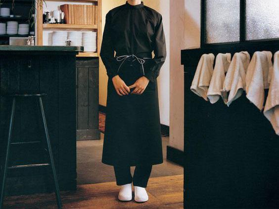 An all-black cafe uniform